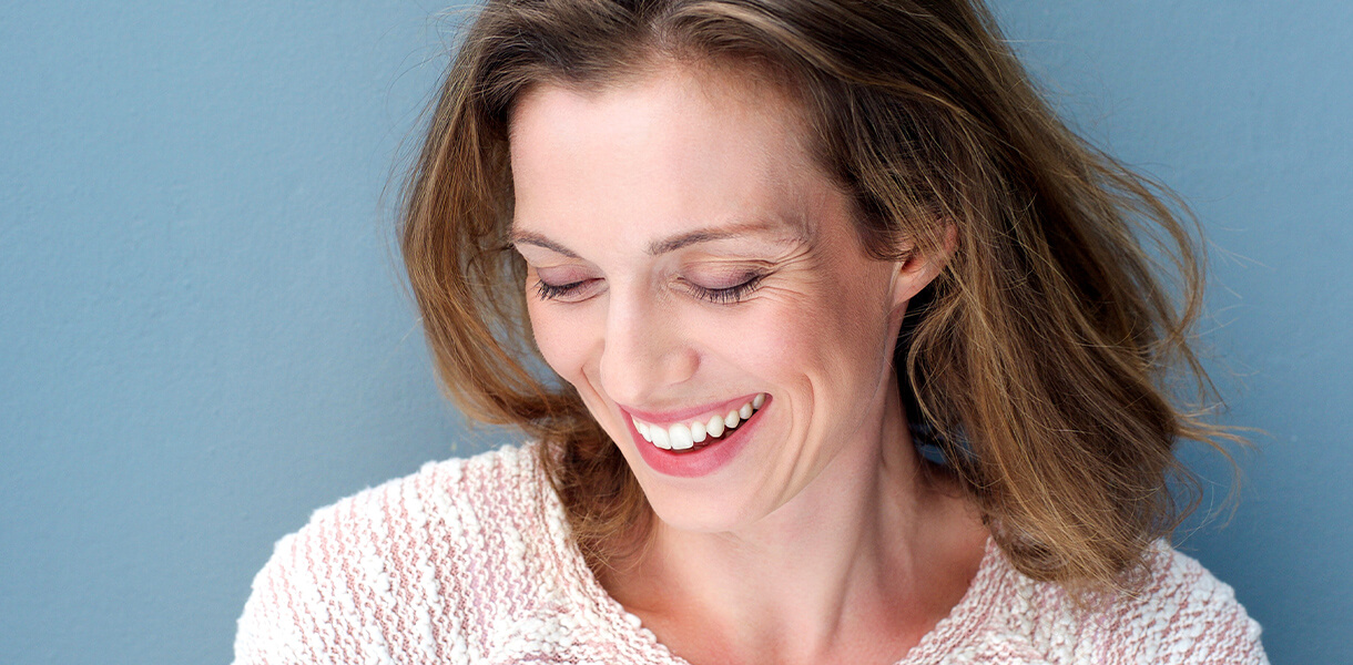Lady with All On 4 Dental Implants in Independence MO