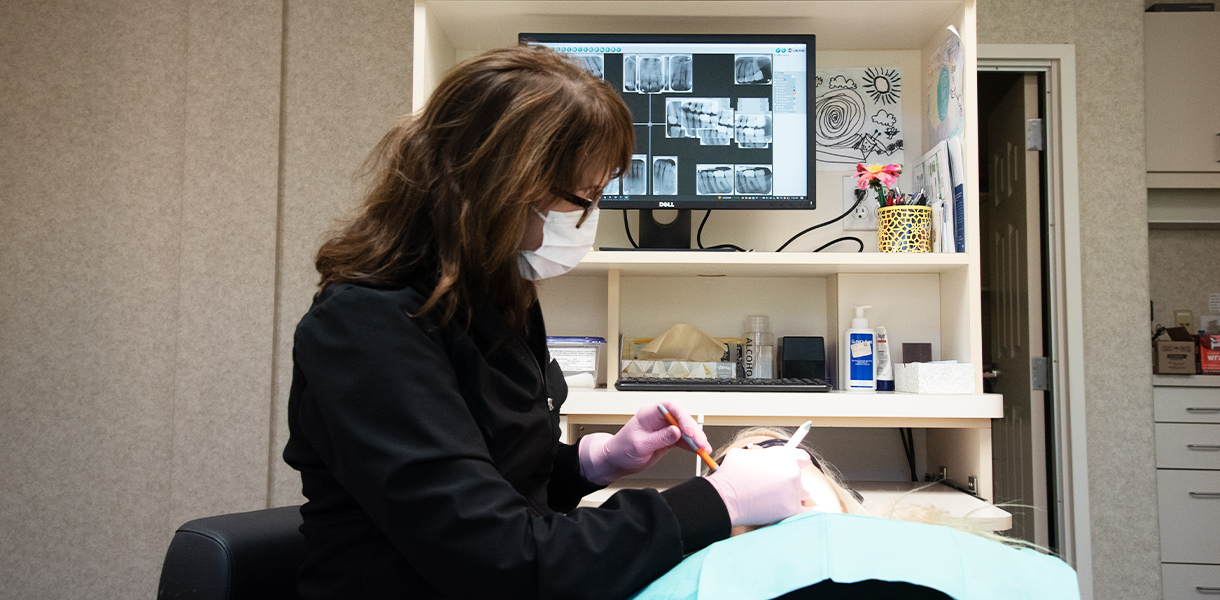 hdr_DentalServices Technician performing Dental Services in Independence MO