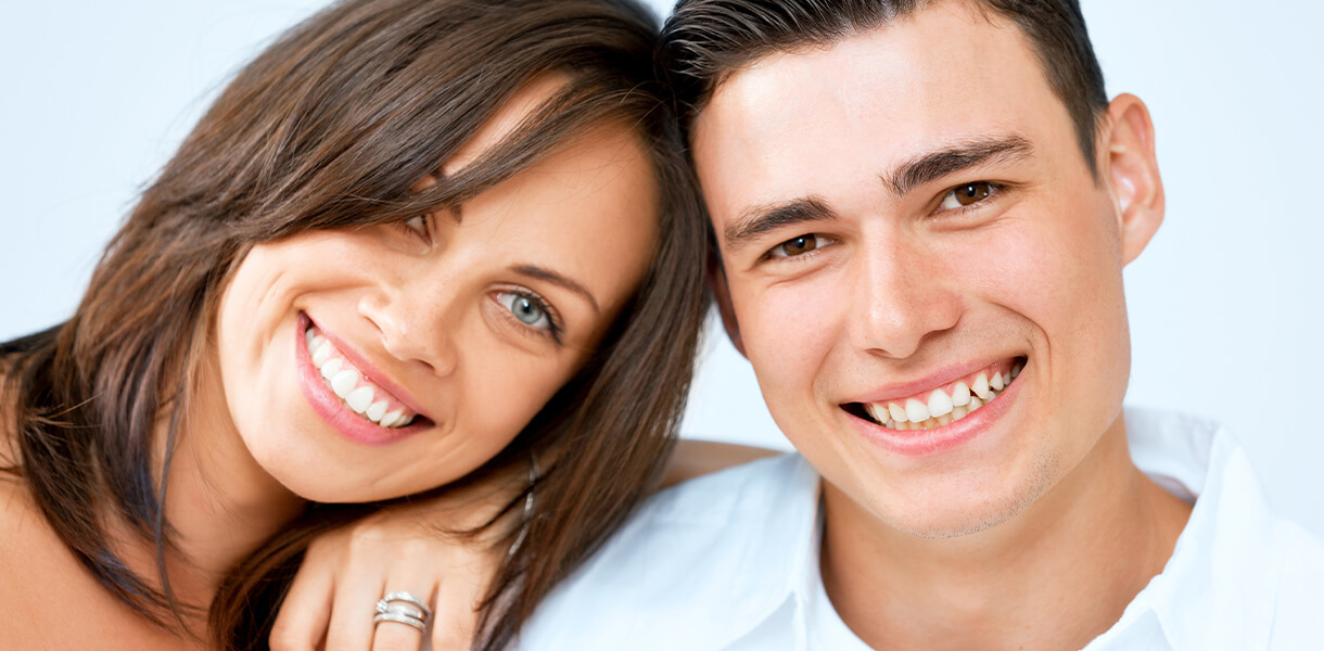 Couple with teeth whitening in Independence MO